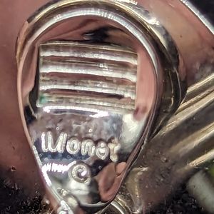 Tiny vintage Monet clip on earrings. J-015